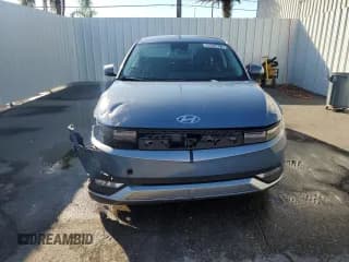 ✅ 2023 Hyundai Ioniq 5 SEL • VIN: KM8KNDAF6PU215773 • Лот: 89623875. Опубликован ранее на Copart с пробегом 26 983 миль. Бесплатный доступ к архиву аукционных продаж из США и подробный отчёт об истории автомобиля на DreamBid. Изображение 5.