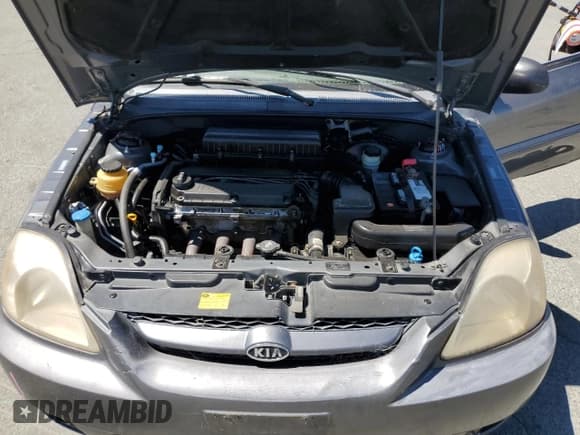 ✅ 2004 Kia Rio • VIN: KNADC125346339018 • Лот: 68951385. Опубликован ранее на Copart с пробегом 195 086 миль. Бесплатный доступ к архиву аукционных продаж из США и подробный отчёт об истории автомобиля на DreamBid. Изображение 11.