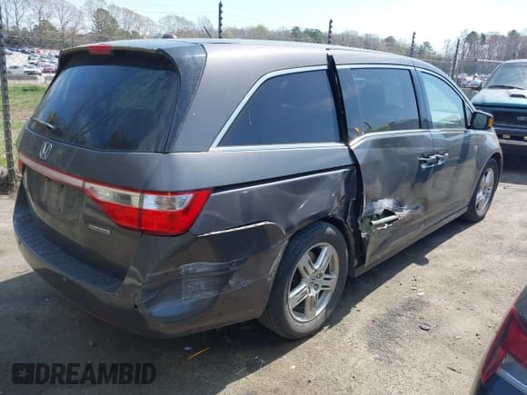 ✅ 2012 Honda Odyssey Touring • VIN: 5FNRL5H92CB116899 • Lot: 41907863. Listed on IAAI with 225,221 mi. Free auction sales archive from the USA and detailed vehicle history report at DreamBid. Image 4.