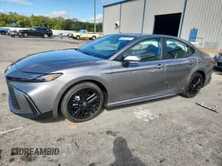 2025 Toyota Camry SE with VIN 4T1DAACK0SU629914, listed as a Copart auction lot 90032825 with 9,436 mi miles and Salvage title. Bid and sale history available at DreamBid. Image 1.