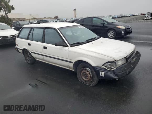 ✅ 1992 Toyota Corolla • VIN: JT2AE94K4N3500103 • Lot: 93150605. Wystawiony na Copart z przebiegiem 330 269 mil. Bezpłatny archiwum sprzedaży aukcyjnych z USA i szczegółowy raport historii pojazdu na DreamBid. Zdjęcie 4.