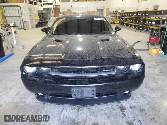 ✅ 2012 Dodge Challenger SXT • VIN: 2C3CDYAG4CH204297 • Lot: 84712494. Wystawiony na Copart z przebiegiem 180 580 mil. Bezpłatny archiwum sprzedaży aukcyjnych z USA i szczegółowy raport historii pojazdu na DreamBid. Zdjęcie 5.