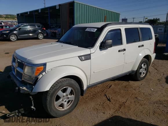 2008 Dodge Nitro SXT z VIN 1D8GU28K68W197352, wystawiony jako Copart lot #73792214 z przebiegiem 229 221 mil mil oraz Nie do naprawy • Non repairable. Historia ofert i sprzedaży dostępna na DreamBid. Obrazek 1.