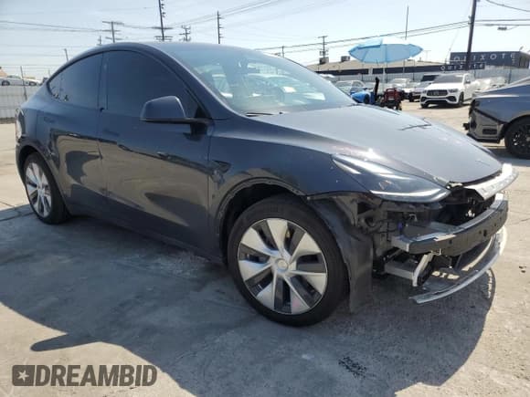 ✅ 2024 Tesla Model Y Long Range • VIN: 7SAYGDEE0RF024326 • Lot: 52149675. Listed on Copart with 34,503 mi. Free auction sales archive from the USA and detailed vehicle history report at DreamBid. Image 4.