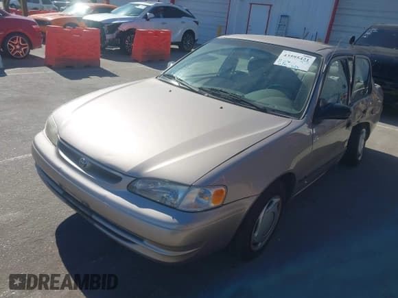 ✅ 1999 Toyota Corolla LE • VIN: 1NXBR12EXXZ231130 • Лот: 43595421. Опубликован ранее на IAAI с пробегом 126 441 миль. Бесплатный доступ к архиву аукционных продаж из США и подробный отчёт об истории автомобиля на DreamBid. Изображение 2.