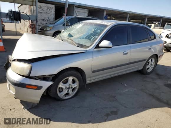 2002 Hyundai Elantra GT z VIN KMHDN55DX2U069068, wystawiony jako Copart lot #73525214 z przebiegiem 195 048 mil mil oraz Szkoda całkowita • Salvage title. Historia ofert i sprzedaży dostępna na DreamBid. Obrazek 1.