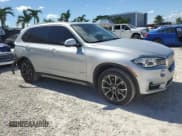 ✅ 2018 BMW X5 sDrive35i • VIN: 5UXKR2C5XJ0Z14841 • Lot: 86193305. Listed on Copart with 99,396 mi. Free auction sales archive from the USA and detailed vehicle history report at DreamBid. Image 4.