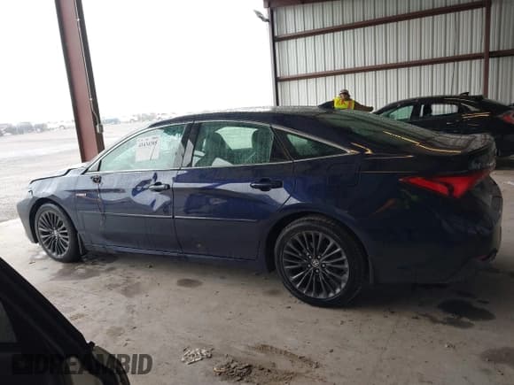 ✅ 2021 Toyota Avalon Hybrid XSE • VIN: 4T1EA1AB4MU002675 • Lot: 43434385. Listed on IAAI with 261,055 mi. Free auction sales archive from the USA and detailed vehicle history report at DreamBid. Image 14.
