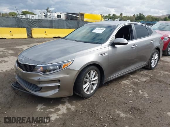 ✅ 2018 Kia Optima LX • VIN: 5XXGT4L38JG264134 • Lot: 43449909. Listed on IAAI with 95,394 mi. Free auction sales archive from the USA and detailed vehicle history report at DreamBid. Image 2.