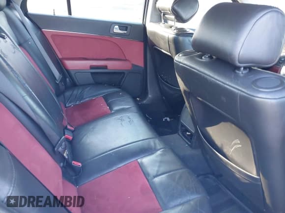 ✅ 2006 Cadillac STS-V • VIN: 1G6DX67DX60180432 • Lot: 41401499. Listed on IAAI with Not provided. Free auction sales archive from the USA and detailed vehicle history report at DreamBid. Image 8.