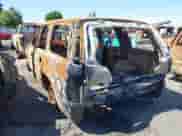 2005 Chevrolet Tahoe LT with VIN 1GNEC13T35R103223, listed as a IAAI auction lot 42165644 with Not provided miles and . Bid and sale history available at DreamBid. Image 3.