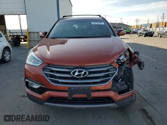 2017 Hyundai Santa Fe 2.0T z VIN 5XYZUDLA7HG490689, wystawiony jako Copart lot #53673385 z przebiegiem 131 435 mil mil oraz Szkoda całkowita • Salvage title. Historia ofert i sprzedaży dostępna na DreamBid. Obrazek 5.