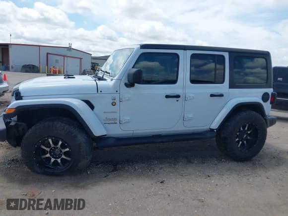 ✅ 2022 Jeep Wrangler Unlimited Sahara • VIN: 1C4HJXEN5NW144922 • Lot: 42452901. Listed on IAAI with 51,223 mi. Free auction sales archive from the USA and detailed vehicle history report at DreamBid. Image 14.