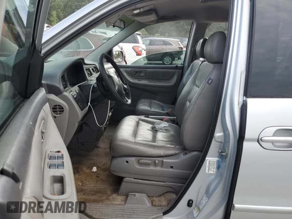 ✅ 2003 Honda Odyssey EX-L • VIN: 5FNRL18903B028216 • Lot: 66751834. Listed on Copart with Not provided. Free auction sales archive from the USA and detailed vehicle history report at DreamBid. Image 7.