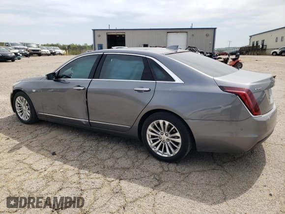 ✅ 2018 Cadillac CT6 Luxury RWD • VIN: 1G6KC5RX5JU103649 • Лот: 52867315. Опубликован ранее на Copart с пробегом 74 199 миль. Бесплатный доступ к архиву аукционных продаж из США и подробный отчёт об истории автомобиля на DreamBid. Изображение 2.