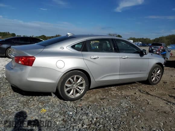 2017 Chevrolet Impala LT with VIN 1G1105S33HU192522, listed as a Copart auction lot 82408215 with 96,024 mi miles and Salvage title. Bid and sale history available at DreamBid. Image 3.
