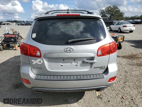 ✅ 2009 Hyundai Santa Fe Limited • VIN: 5NMSH13E39H317928 • Lot: 85739164. Listed on Copart with 73,984 mi. Free auction sales archive from the USA and detailed vehicle history report at DreamBid. Image 6.