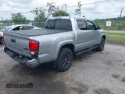 ✅ 2021 Toyota Tacoma SR5 • VIN: 3TYAZ5CN0MT003244 • Lot: 42942708. Listed on IAAI with 55,848 mi. Free auction sales archive from the USA and detailed vehicle history report at DreamBid. Image 4.