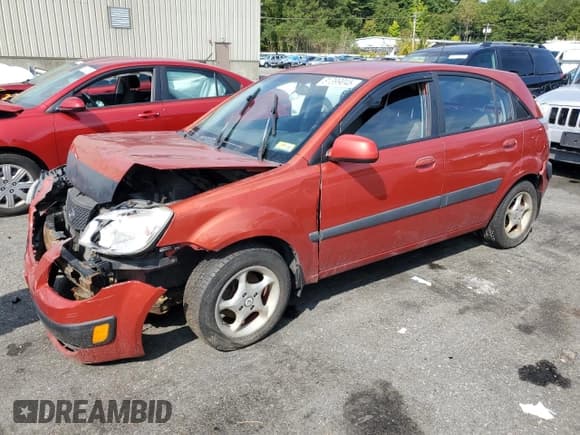 ✅ 2009 Kia Rio LX • VIN: KNADE243896494277 • Lot: 81399045. Listed on Copart with Not provided. Free auction sales archive from the USA and detailed vehicle history report at DreamBid. Image 1.
