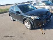 ✅ 2014 Mazda CX-5 Touring • VIN: JM3KE4CY3E0302724 • Lot: 43319905. Wystawiony na IAAI z przebiegiem 128 003 mil. Bezpłatny archiwum sprzedaży aukcyjnych z USA i szczegółowy raport historii pojazdu na DreamBid. Zdjęcie 1.