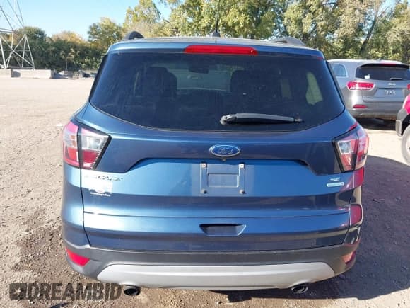 ✅ 2018 Ford Escape SE • VIN: 1FMCU0GD8JUA80339 • Lot: 43457091. Listed on IAAI with 114,743 mi. Free auction sales archive from the USA and detailed vehicle history report at DreamBid. Image 17.