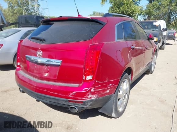 ✅ 2010 Cadillac SRX Premium Collection • VIN: 3GYFNCEY0AS648423 • Lot: 43332591. Wystawiony na IAAI z przebiegiem 182 286 mil. Bezpłatny archiwum sprzedaży aukcyjnych z USA i szczegółowy raport historii pojazdu na DreamBid. Zdjęcie 4.