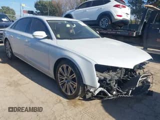 ✅ 2014 Audi A8 3.0T • VIN: WAURGAFDXEN006902 • Lot: 41099662. Listed on IAAI with 118,734 mi. Free auction sales archive from the USA and detailed vehicle history report at DreamBid. Image 1.