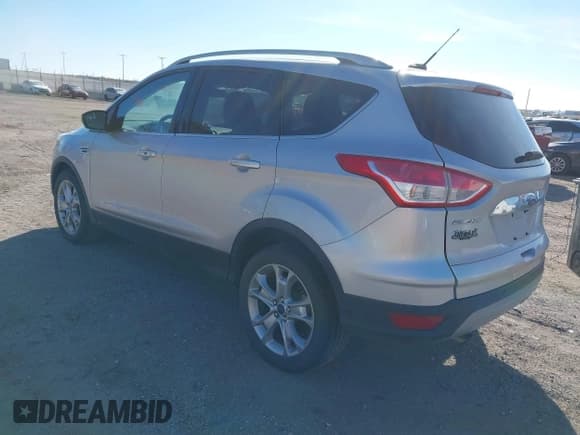 ✅ 2016 Ford Escape Titanium • VIN: 1FMCU9JX6GUB59315 • Lot: 43665895. Wystawiony na IAAI z przebiegiem 127 540 mil. Bezpłatny archiwum sprzedaży aukcyjnych z USA i szczegółowy raport historii pojazdu na DreamBid. Zdjęcie 3.