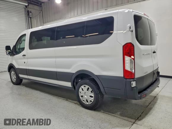 ✅ 2023 Ford Transit Passenger XLT • VIN: 1FBAX2YGXPKA58486 • Lot: 94293235. Listed on Copart with 51,472 mi. Free auction sales archive from the USA and detailed vehicle history report at DreamBid. Image 2.