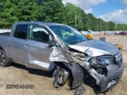 ✅ 2020 Honda Ridgeline RTL • VIN: 5FPYK3F5XLB025857 • Lot: 42307343. Listed on IAAI with 97,262 mi. Free auction sales archive from the USA and detailed vehicle history report at DreamBid. Image 6.