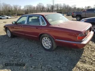 ✅ 2001 Jaguar XJ • VIN: SAJDA14C01LF26898 • Лот: 39427894. Опубликован ранее на Copart с пробегом 77 970 миль. Бесплатный доступ к архиву аукционных продаж из США и подробный отчёт об истории автомобиля на DreamBid. Изображение 2.