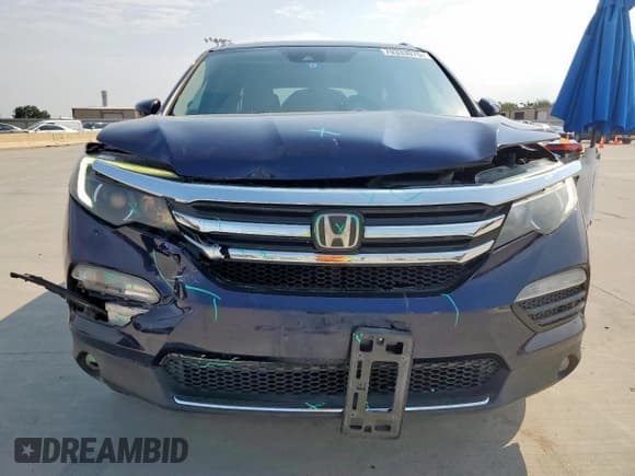 ✅ 2018 Honda Pilot Touring • VIN: 5FNYF5H94JB006212 • Lot: 70333075. Listed on Copart with 130,677 mi. Free auction sales archive from the USA and detailed vehicle history report at DreamBid. Image 5.