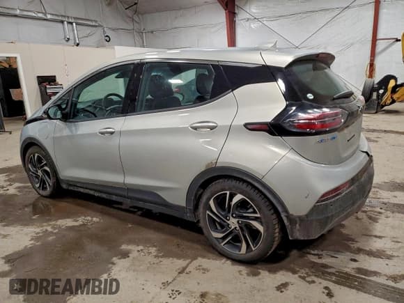 ✅ 2023 Chevrolet Bolt EV 2LT • VIN: 1G1FX6S07P4173869 • Lot: 93307175. Listed on Copart with 31,072 mi. Free auction sales archive from the USA and detailed vehicle history report at DreamBid. Image 2.