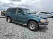 1997 Ford Explorer XL z VIN 1FMDU34E1VZC23403, wystawiony jako Copart lot #80118535 z przebiegiem 148 381 mil mil oraz Nie do naprawy • Non repairable. Historia ofert i sprzedaży dostępna na DreamBid. Obrazek 4.