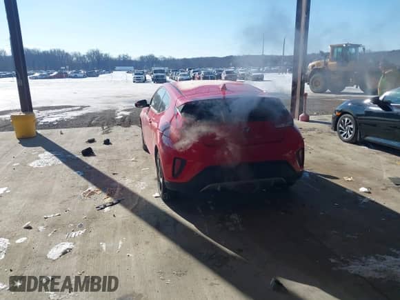 2019 Hyundai Veloster Premium with VIN KMHTG6AF6KU005242, listed as a IAAI auction lot 41358050 with 124,415 mi miles and . Bid and sale history available at DreamBid. Image 3.