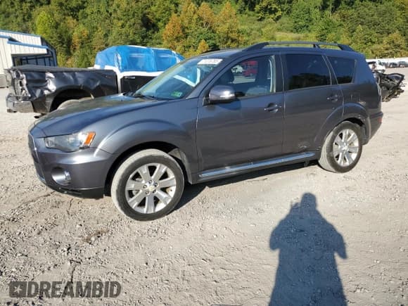 ✅ 2012 Mitsubishi Outlander SE • VIN: JA4JT3AW6CU004268 • Lot: 71076785. Wystawiony na Copart z przebiegiem 128 430 mil. Bezpłatny archiwum sprzedaży aukcyjnych z USA i szczegółowy raport historii pojazdu na DreamBid. Zdjęcie 1.