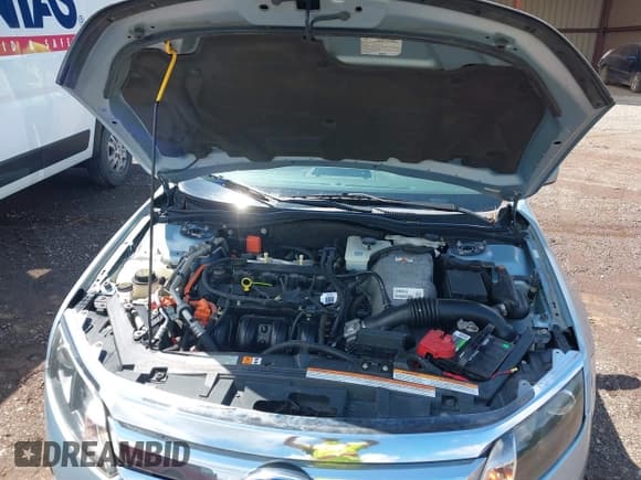 ✅ 2011 Ford Fusion Hybrid • VIN: 3FADP0L37BR264490 • Lot: 42253495. Wystawiony na IAAI z przebiegiem 112 866 mil. Bezpłatny archiwum sprzedaży aukcyjnych z USA i szczegółowy raport historii pojazdu na DreamBid. Zdjęcie 10.