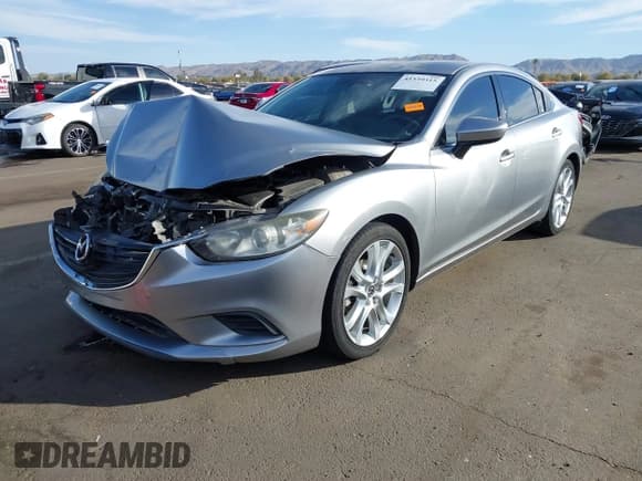 ✅ 2015 Mazda 6 i Touring • VIN: JM1GJ1V56F1210501 • Lot: 41539315. Listed on IAAI with 98,669 mi. Free auction sales archive from the USA and detailed vehicle history report at DreamBid. Image 2.