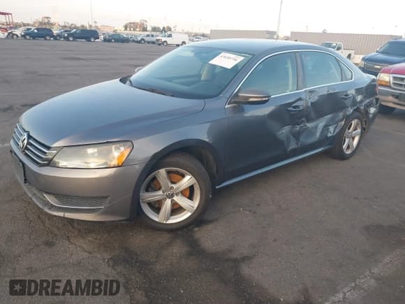 ✅ 2012 Volkswagen Passat SE • VIN: 1VWBP7A35CC071605 • Lot: 43650796. Listed on IAAI with 215,229 mi. Free auction sales archive from the USA and detailed vehicle history report at DreamBid. Image 2.