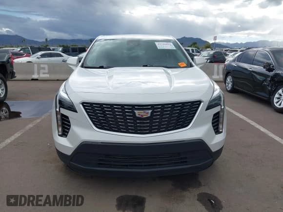 ✅ 2022 Cadillac XT4 FWD Luxury • VIN: 1GYAZAR49NF107519 • Lot: 43726863. Wystawiony na IAAI z przebiegiem 59 324 mil. Bezpłatny archiwum sprzedaży aukcyjnych z USA i szczegółowy raport historii pojazdu na DreamBid. Zdjęcie 12.