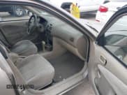 ✅ 1998 Toyota Corolla CE • VIN: 1NXBR12E7WZ076552 • Lot: 43885862. Listed on IAAI with 153,374 mi. Free auction sales archive from the USA and detailed vehicle history report at DreamBid. Image 5.