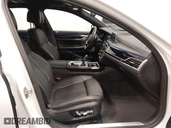 ✅ 2022 BMW 7 Series 750i xDrive • VIN: WBA7U2C03NCG89838 • Lot: 42187695. Listed on IAAI with 27,443 mi. Free auction sales archive from the USA and detailed vehicle history report at DreamBid. Image 5.