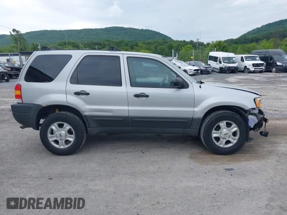 ✅ 2003 Ford Escape XLT Popular 2 • VIN: 1FMYU93193KC76018 • Lot: 42355904. Listed on IAAI with 233,131 mi. Free auction sales archive from the USA and detailed vehicle history report at DreamBid. Image 13.