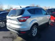 ✅ 2018 Ford Escape SEL • VIN: 1FMCU9HD6JUD01715 • Lot: 43509635. Wystawiony na IAAI z przebiegiem 144 806 mil. Bezpłatny archiwum sprzedaży aukcyjnych z USA i szczegółowy raport historii pojazdu na DreamBid. Zdjęcie 4.
