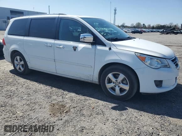 ✅ 2014 Volkswagen Routan • VIN: 2C4RVADG8ER135455 • Lot: 51336385. Listed on Copart with 86,341 mi. Free auction sales archive from the USA and detailed vehicle history report at DreamBid. Image 4.