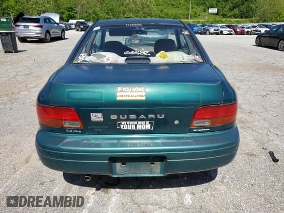 ✅ 1997 Subaru Impreza • VIN: JF1GM4255VH401478 • Lot: 56221515. Listed on Copart with 75,202 mi. Free auction sales archive from the USA and detailed vehicle history report at DreamBid. Image 6.