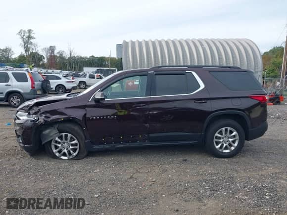 2020 Chevrolet Traverse LT with VIN 1GNEVHKWXLJ319645, listed as a IAAI auction lot 43330855 with 131,084 mi miles and . Bid and sale history available at DreamBid. Image 14.