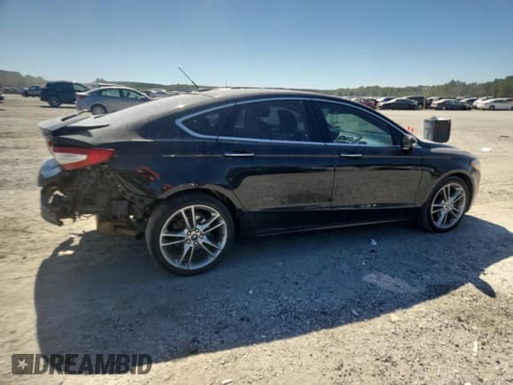 ✅ 2016 Ford Fusion Titanium • VIN: 3FA6P0D9XGR352548 • Lot: 70721425. Listed on Copart with 83,327 mi. Free auction sales archive from the USA and detailed vehicle history report at DreamBid. Image 3.