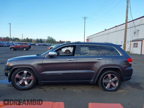 ✅ 2015 Jeep Grand Cherokee Overland • VIN: 1C4RJFCG3FC697994 • Lot: 40526924. Listed on IAAI with 199,275 mi. Free auction sales archive from the USA and detailed vehicle history report at DreamBid. Image 14.