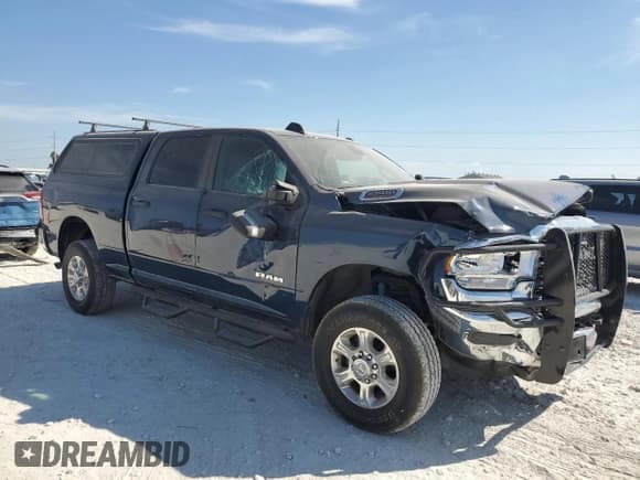 ✅ 2023 Ram 2500 Big Horn • VIN: 3C6UR5DJ2PG569419 • Lot: 87385625. Listed on Copart with 21,642 mi. Free auction sales archive from the USA and detailed vehicle history report at DreamBid. Image 4.